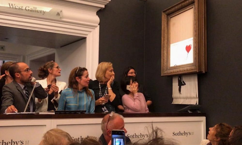 Banksy, quadro si autodistrugge dopo essere stato battuto all'asta: la spiegazione
